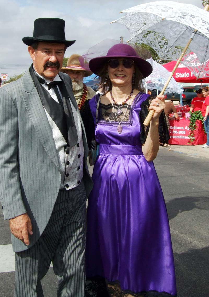 photo of man and woman in costume